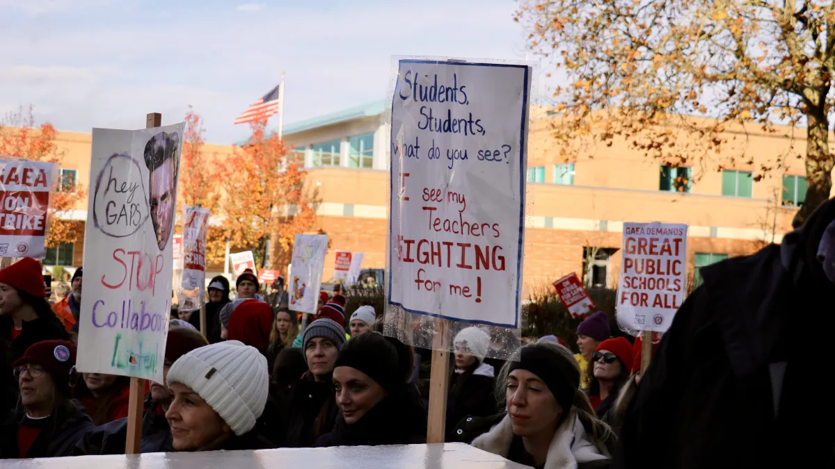 Educators with signs during the Albany strike of 2024