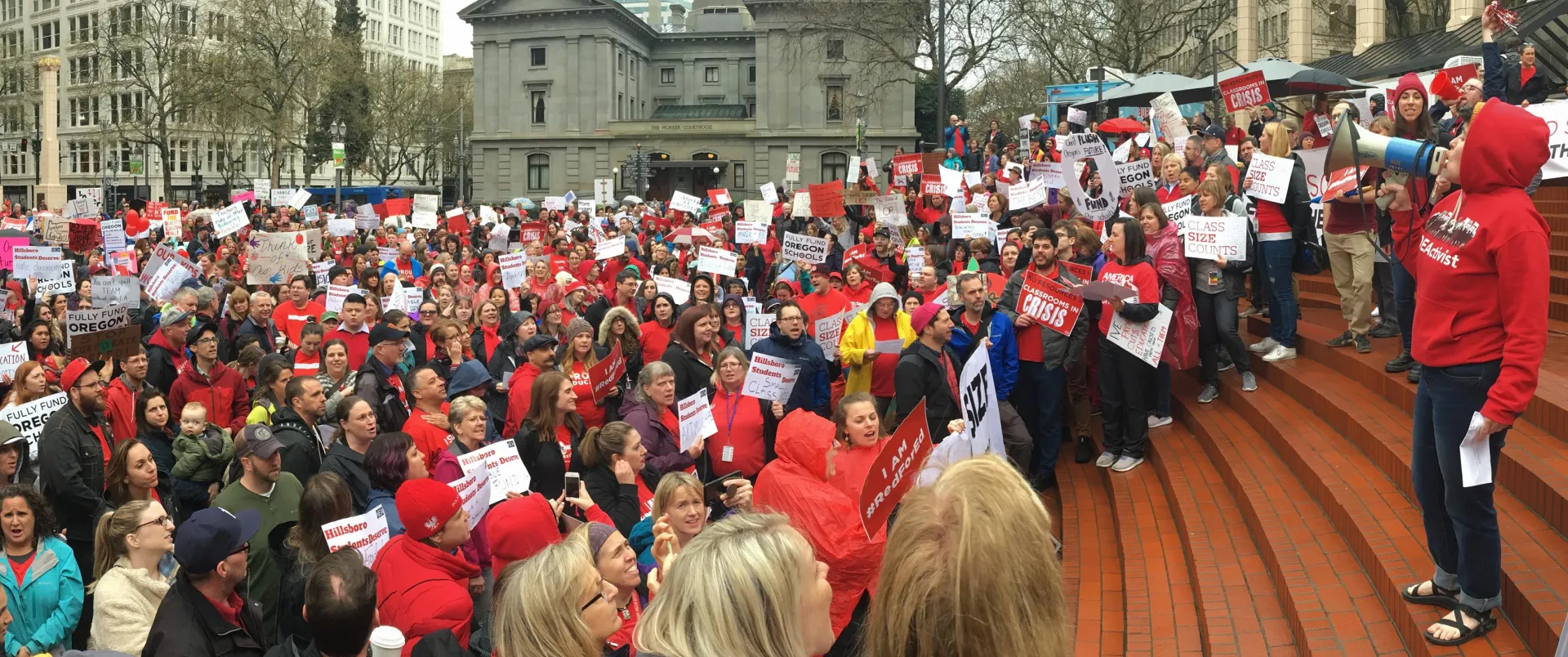 OEA Vice President Lindsay Ray leads a rally chant