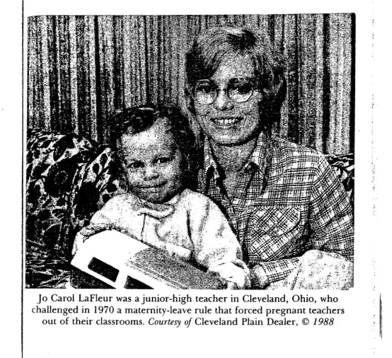 Photo of Jo Carol LaFleur holding toddler